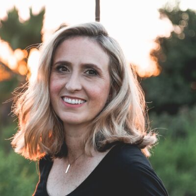 smiling woman in shallow focus photography